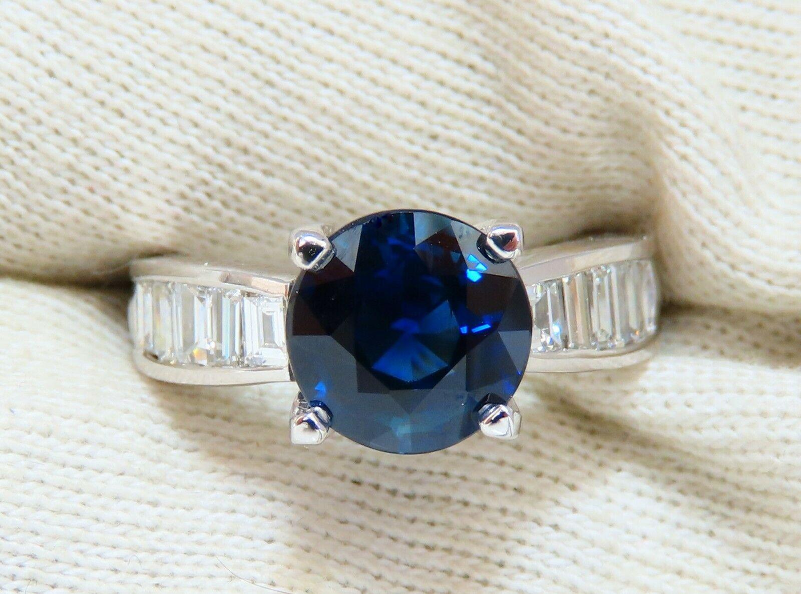 No heat Classic 

GIA Certified 

4.09ct. Natural No heat Blue Sapphire ring.

Report:  2195995565

Round cut: 9.85 - 9.52 X 5.58mm

Transparent, Blue

1.04ct. Side natural Baguette diamonds

F-G color, Vs-2 clarity.

14kt. white gold

6.3