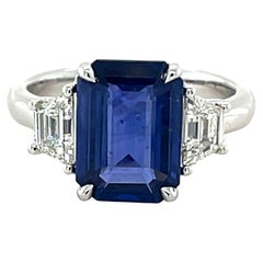 GIA Certified 4.10 Carat Emerald Cut Ceylon Sapphire & Diamond Ring in Platinum