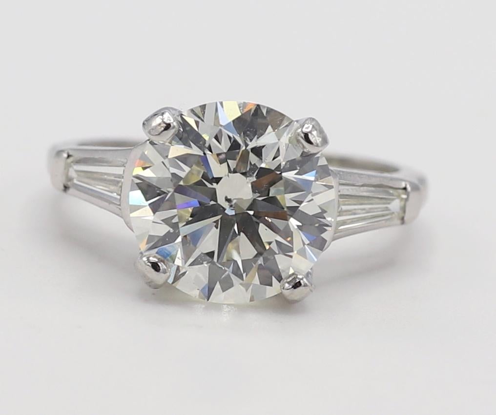 Modern GIA Certified 4.10 Carat L SI2 Round Natural Diamond Platinum Engagement Ring
