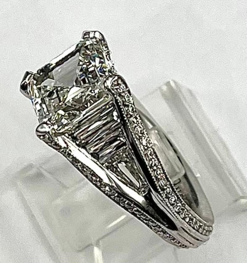 This is a very unique. one of a kind custom Platinum Ring with a large, rare Square Emerald Cut Diamond that is 4.11CT and is I in color and Internally Flawless. It it accompanied by a GIA Report that in addition to indicating the color and clarity,