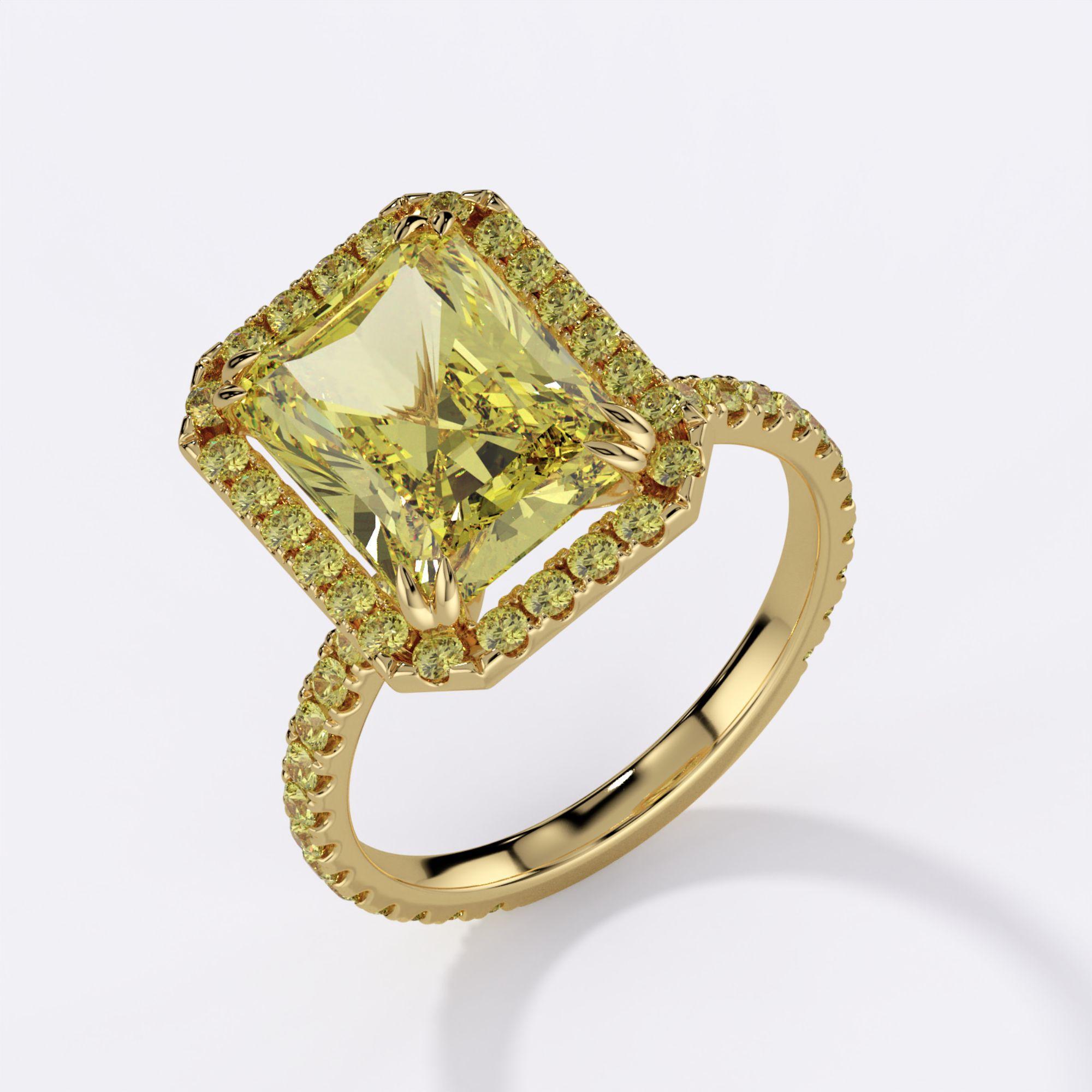 Anello di fidanzamento aureolato con diamante a taglio radiante giallo fancy naturale certificato GIA da 4,12 carati e fascia di diamanti pavé in oro giallo 18 carati.

La pietra è sciolta e può essere realizzata in diverse configurazioni di