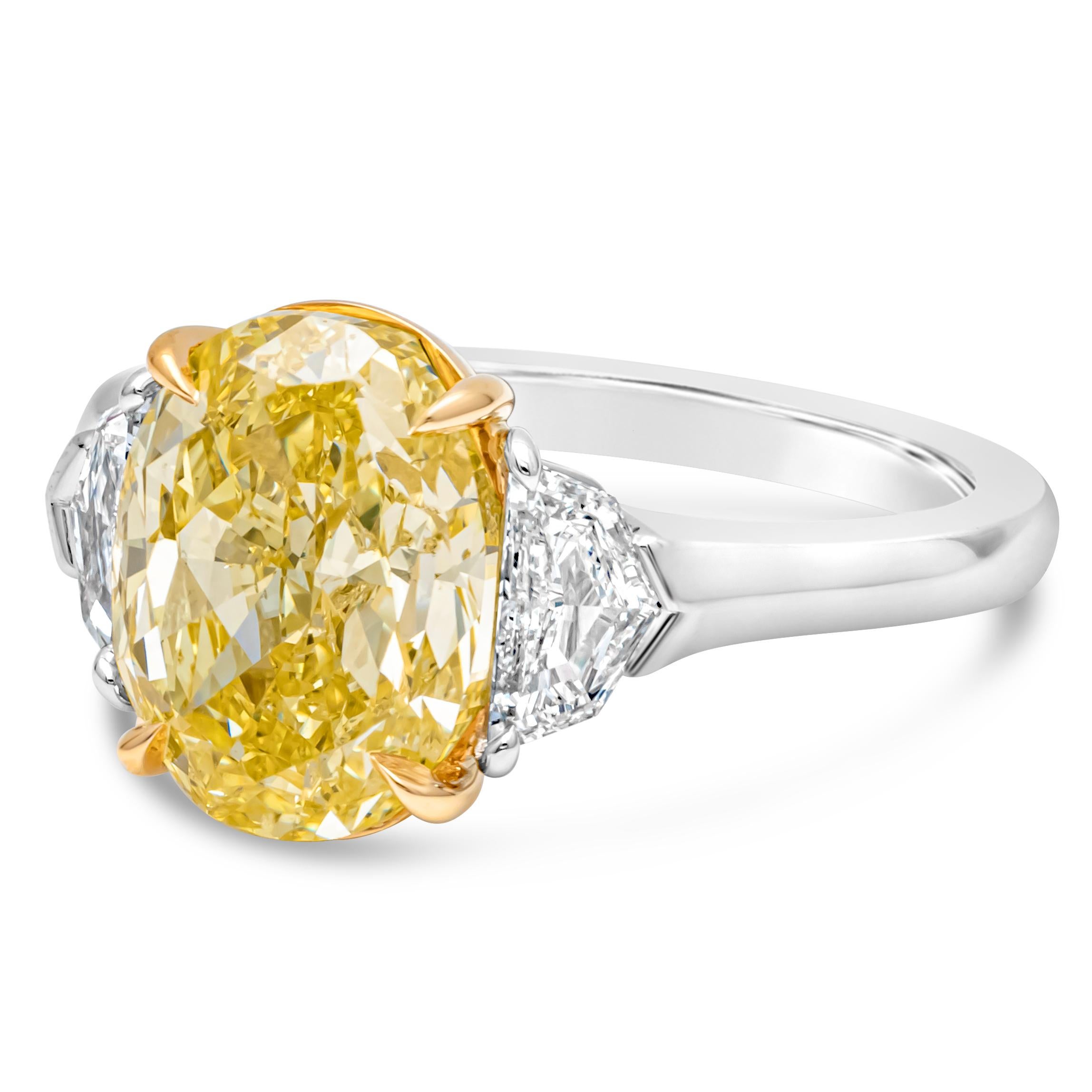 Contemporary GIA Certified 4.12 Carats Oval Cut Fancy Intense Yellow Diamond Ring For Sale