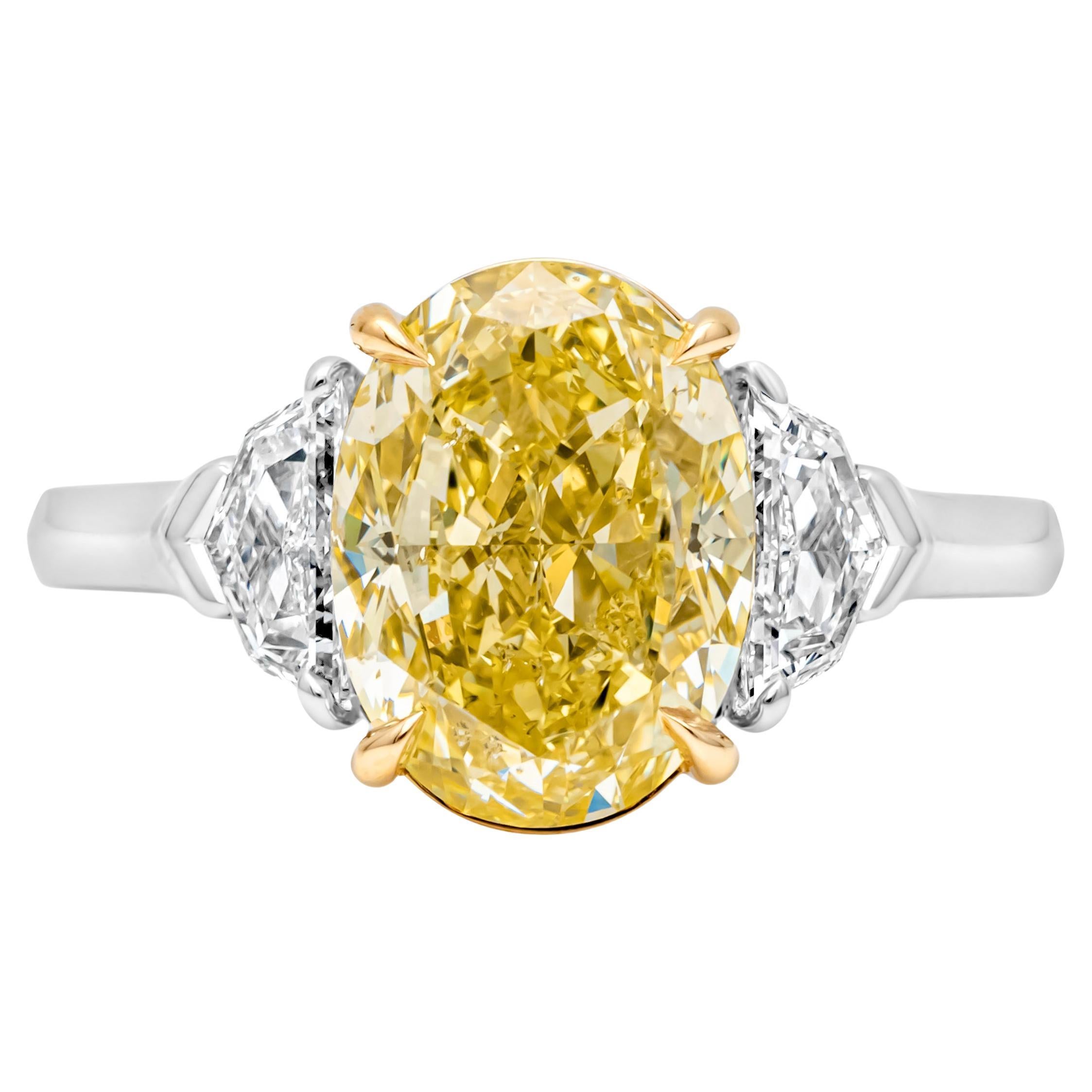 GIA Certified 4.12 Carats Oval Cut Fancy Intense Yellow Diamond Ring For Sale
