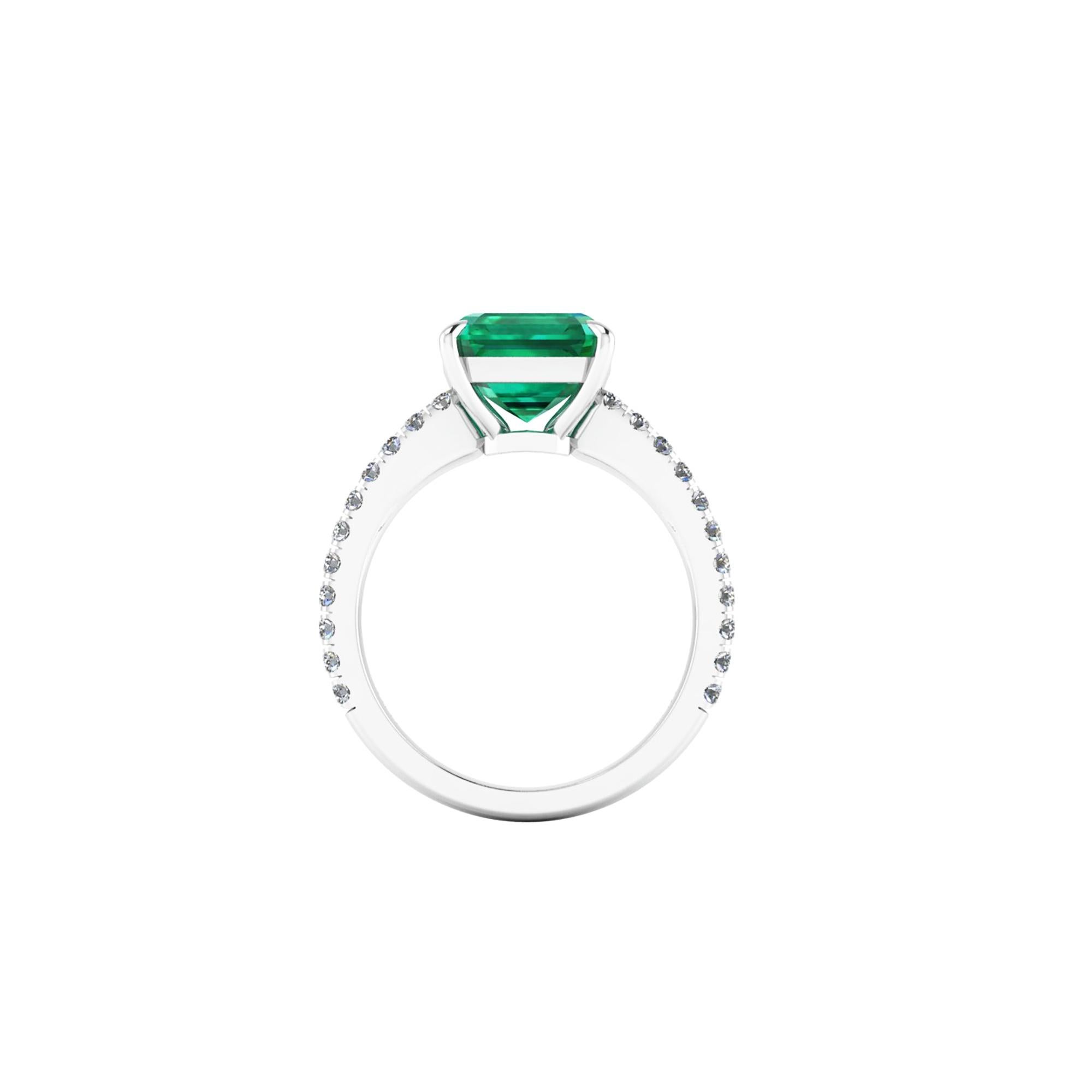 GIA Certified 3.13 carat Emerald cut Emerald, high quality color, eye clean gemstones, embellished by a pave' of bright diamonds of approximately  total carat weight of 0.32 carat, set in a hand crafted Platinum 950 ring, manufactured with the best