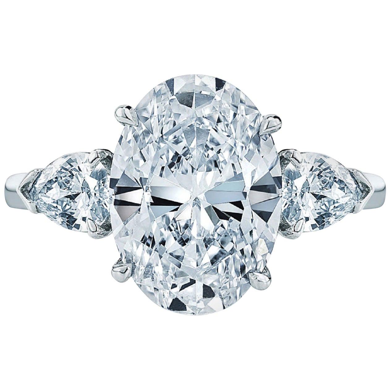 GIA Certified 4.15 Carat 'main stone' Oval Cut Diamond Ring