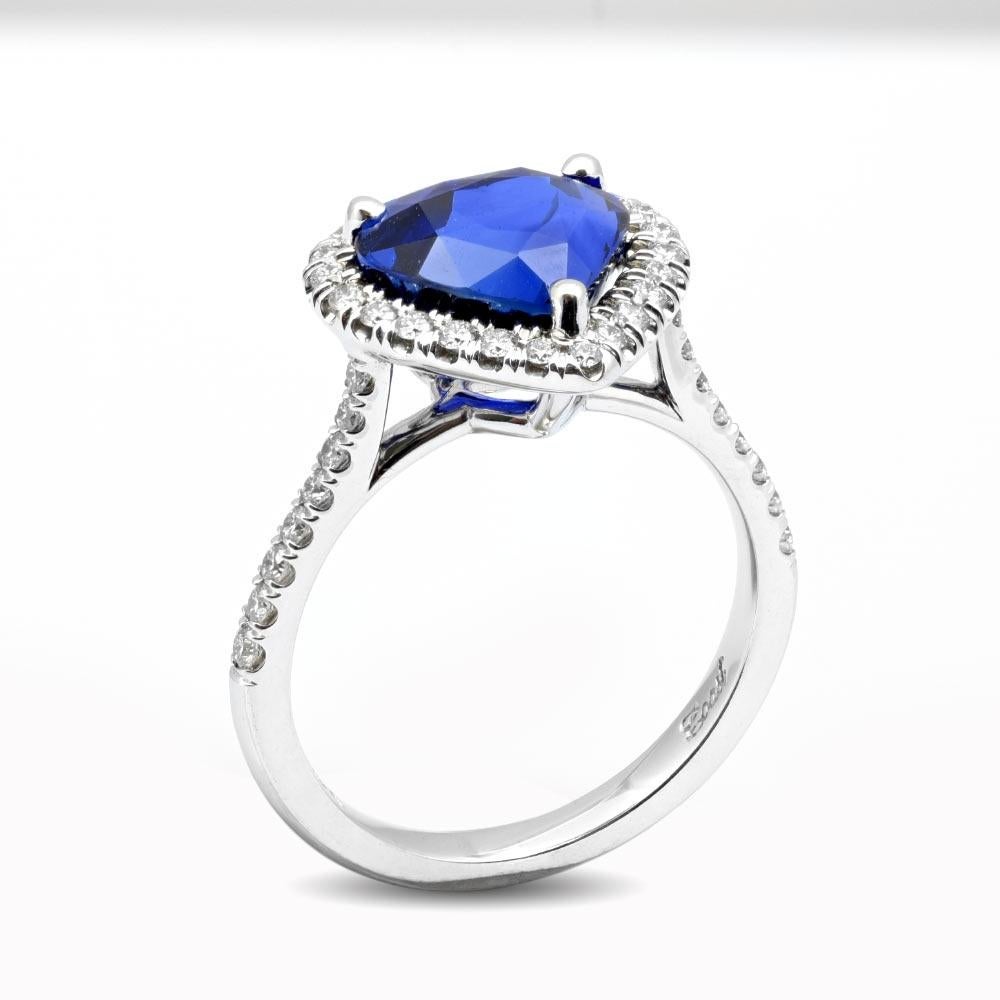 heart shaped diamond ring with blue sapphire