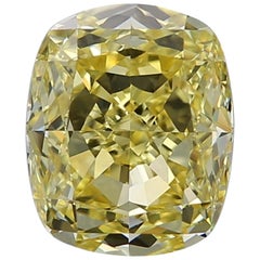GIA Certified 4.16 Carat Fancy Intense Yellow Cushion Diamond VVS1