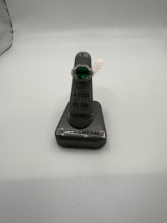 GIA certified 4.16 Carats Colombian Emerald Diamond Ring