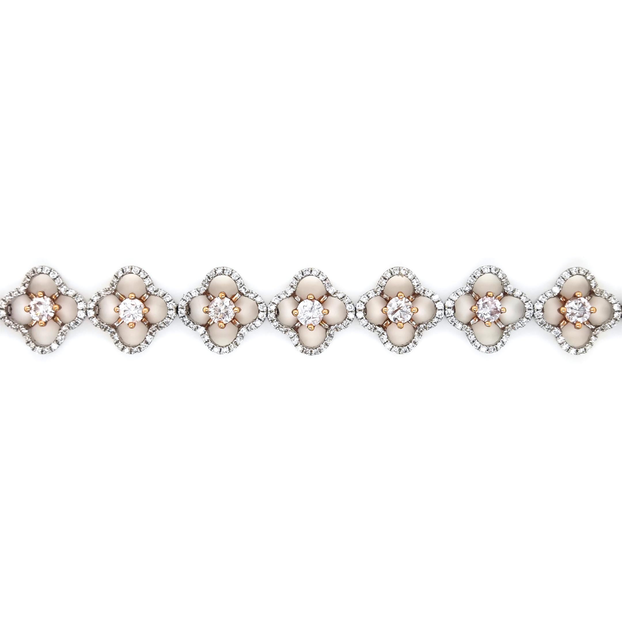 433 Pink and White Diamonds: 4.16 Carats
Metal: 18K Rose and White Gold, 16.50 Grams
Certificate # 1176298549


