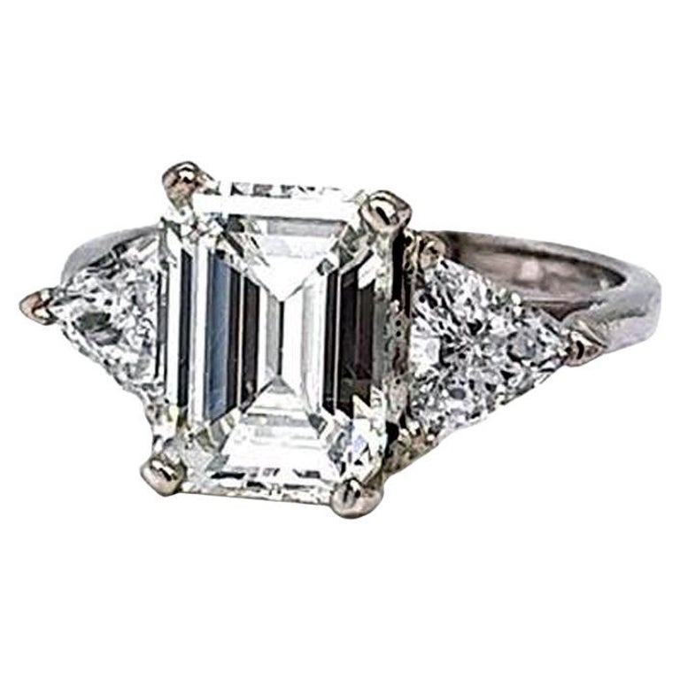 GIA Certified 4.17ctw Emerald Cut Diamond Wedding Ring with Triangular
