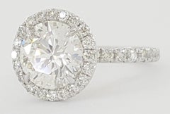 GIA Certified 4.18 Carat Round Brilliant Cut Diamond Halo Platinum Ring