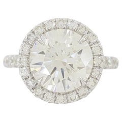 GIA Certified 4.18 Carat Round Brilliant Cut Diamond Halo Platinum Ring