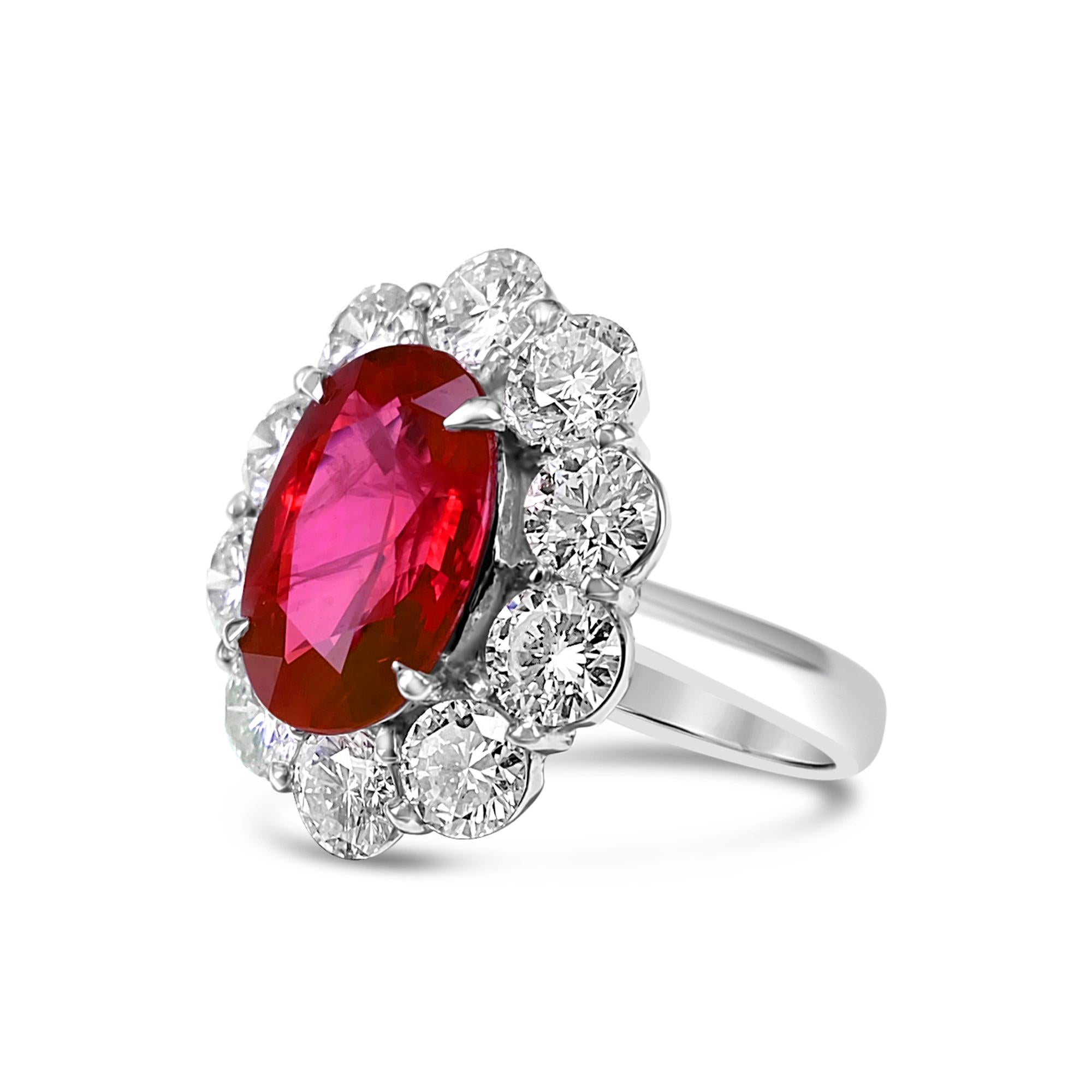 GIA Certified 4.18 Carat Ruby from Burma are set with D color VVS clarity diamond in this PT 900 wedding ring. Burmese rubies are rarer than even diamonds. Because of their absolute rarity and high global demand, every high-quality piece is priced