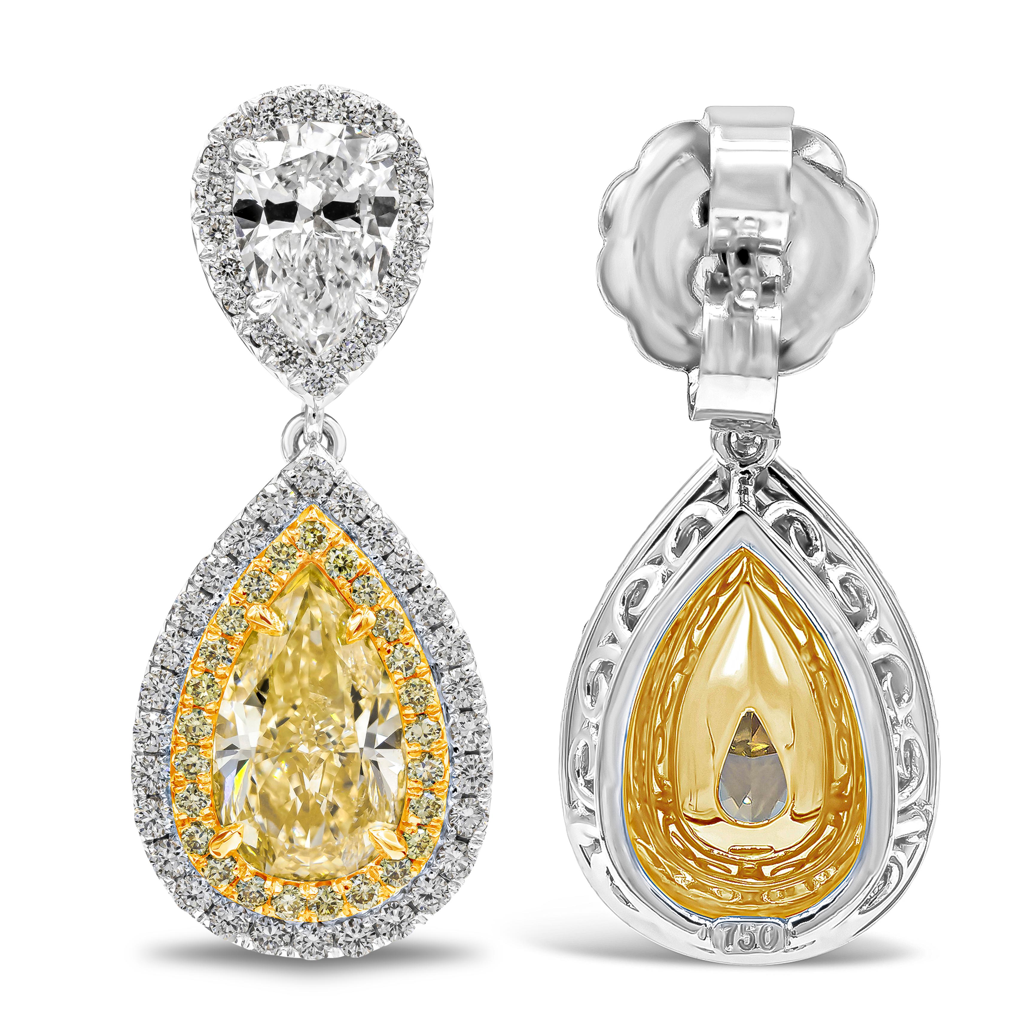 Contemporary GIA Certified 4.19 Carats Total Yellow Diamond Double Halo Dangle Earrings For Sale