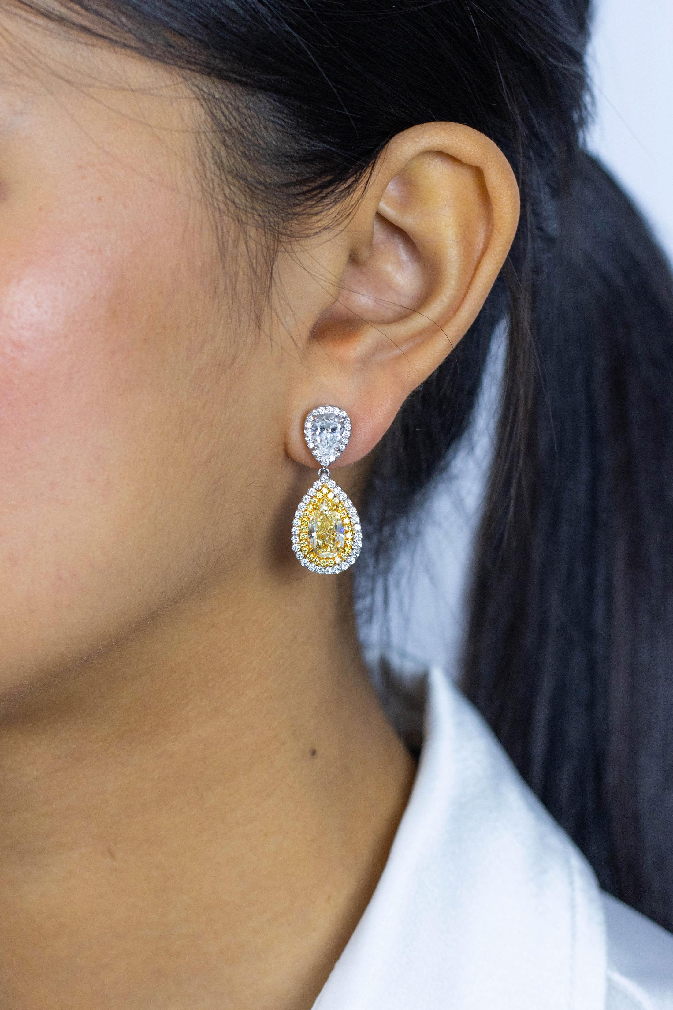 Women's GIA Certified 4.19 Carats Total Yellow Diamond Double Halo Dangle Earrings For Sale