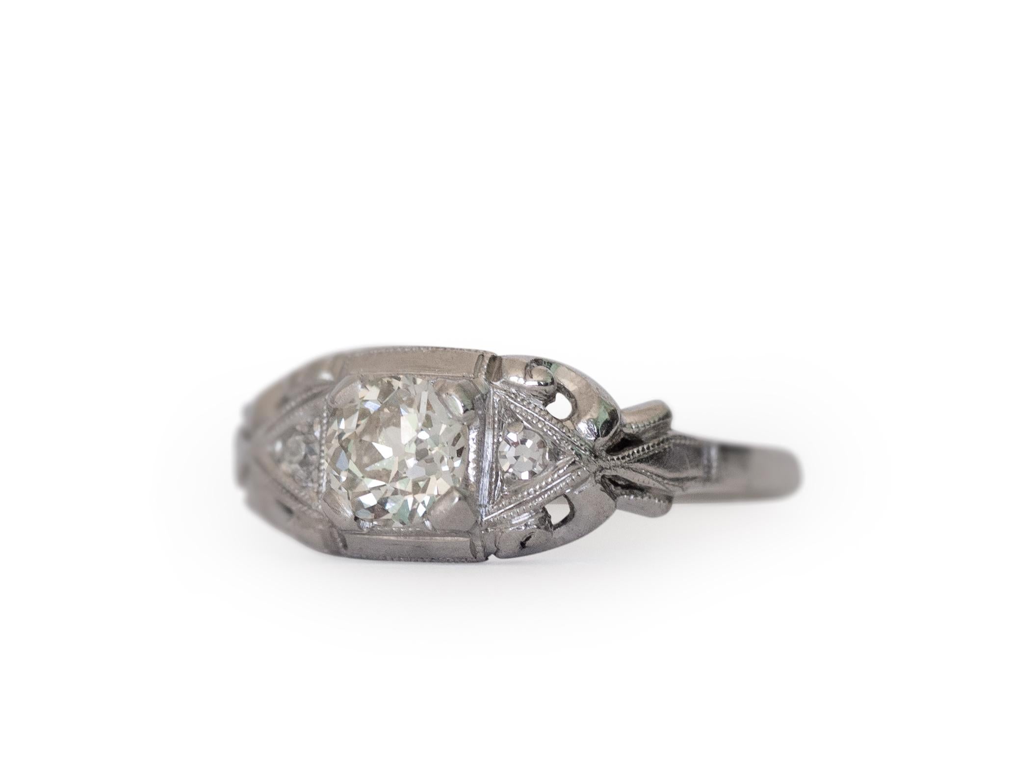 Ring Size: 5
Metal Type: Platinum  [Hallmarked, and Tested]
Weight: 3  grams

Center Diamond Details:
GIA REPORT #: 5202 986700
Weight: .42 carat
Cut: Old European Brilliant
Color: L
Clarity: VS2

Side Diamond Details:
Weight: .04 carat
Cut: Antique