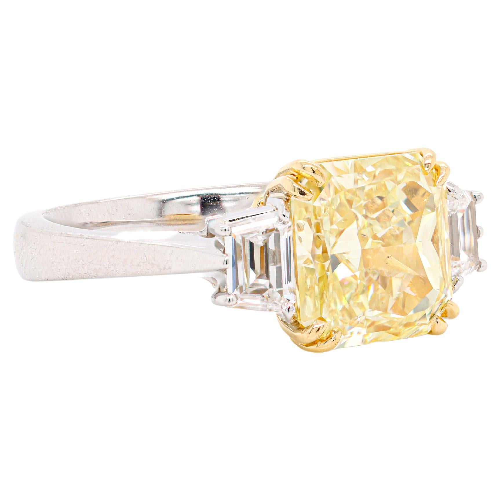 GIA Certified 4.20 Carat Fancy Intense Yellow Radiant Cut Three-Stone Ring For Sale 1