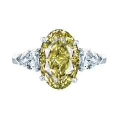 GIA Certified 3.50 Carat Oval Cut Fancy Yellow Diamond White Gold Ring