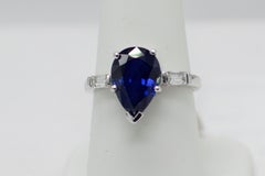 GIA Certified 4.20 Carat Pear Shape blue  sapphire Ring  in Platinum.