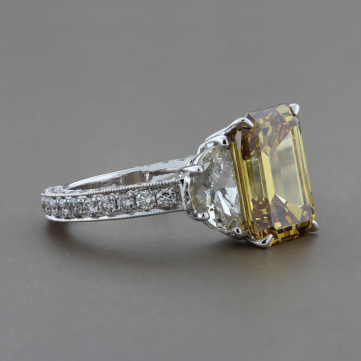 4.21 carat fancy deep brownish yellow emerald cut diamond.  A truly gorgeous and deep color that is hard to find in a diamond.  GIA states the VVS2 clarity diamond has been processed by high pressure/high temperature.  Two brilliant VS clarity half
