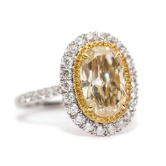 4.22 Carat Yellow White Diamond Oval Shape Halo Platinum GIA Engagement Ring