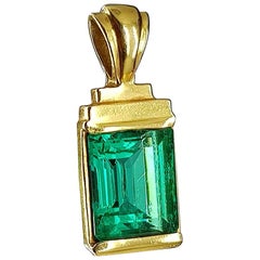 GIA Certified 4.23 Carat Emerald Cut Emerald Set in 18 Karat Yellow Gold