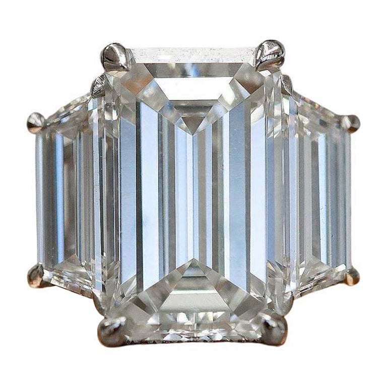 GIA Certified 4.25 Carat Three Stone Emerald Cut Diamond Ring For Sale