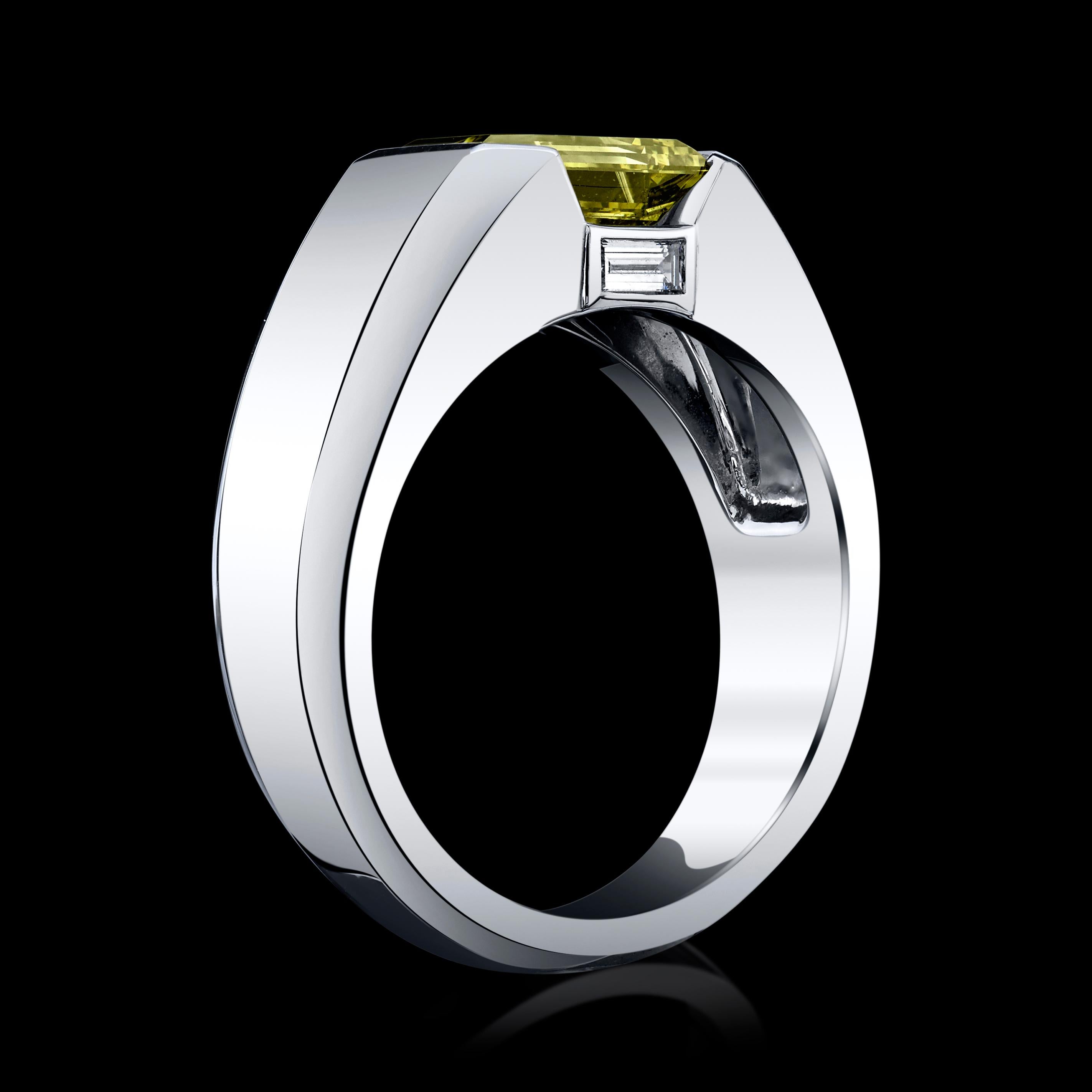 This 4.27ct Emerald cut Natural Diamond ring has a very special color! 

It is graded by GIA as Fancy, Deep Brownish Greenish Yellow diamond with SI1 clarity, and it changes colors as the light changes. Take it out to the sun and it is olive green,