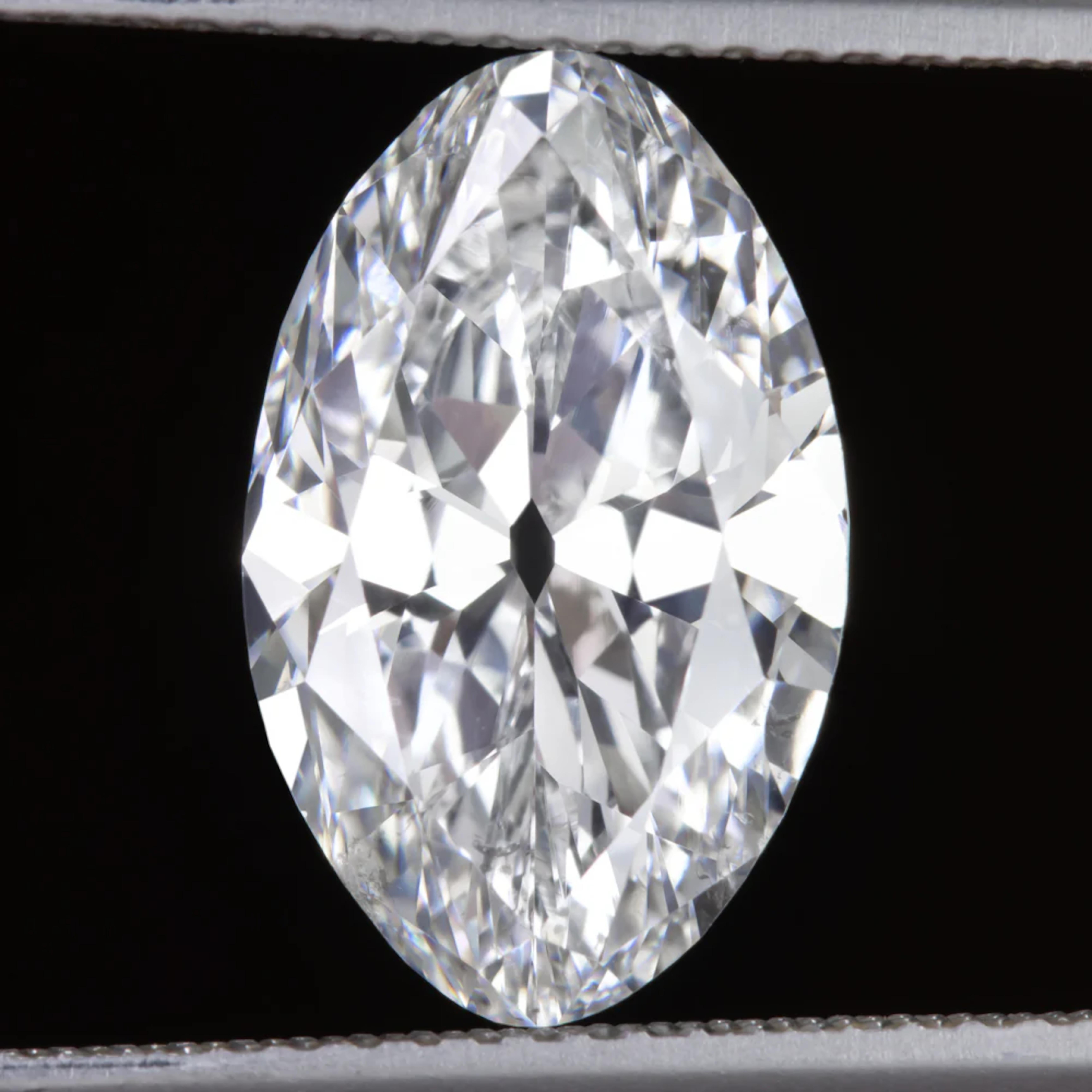 Oval Cut GIA Certified 4.28 Carat Antique Moval Diamond Ring For Sale