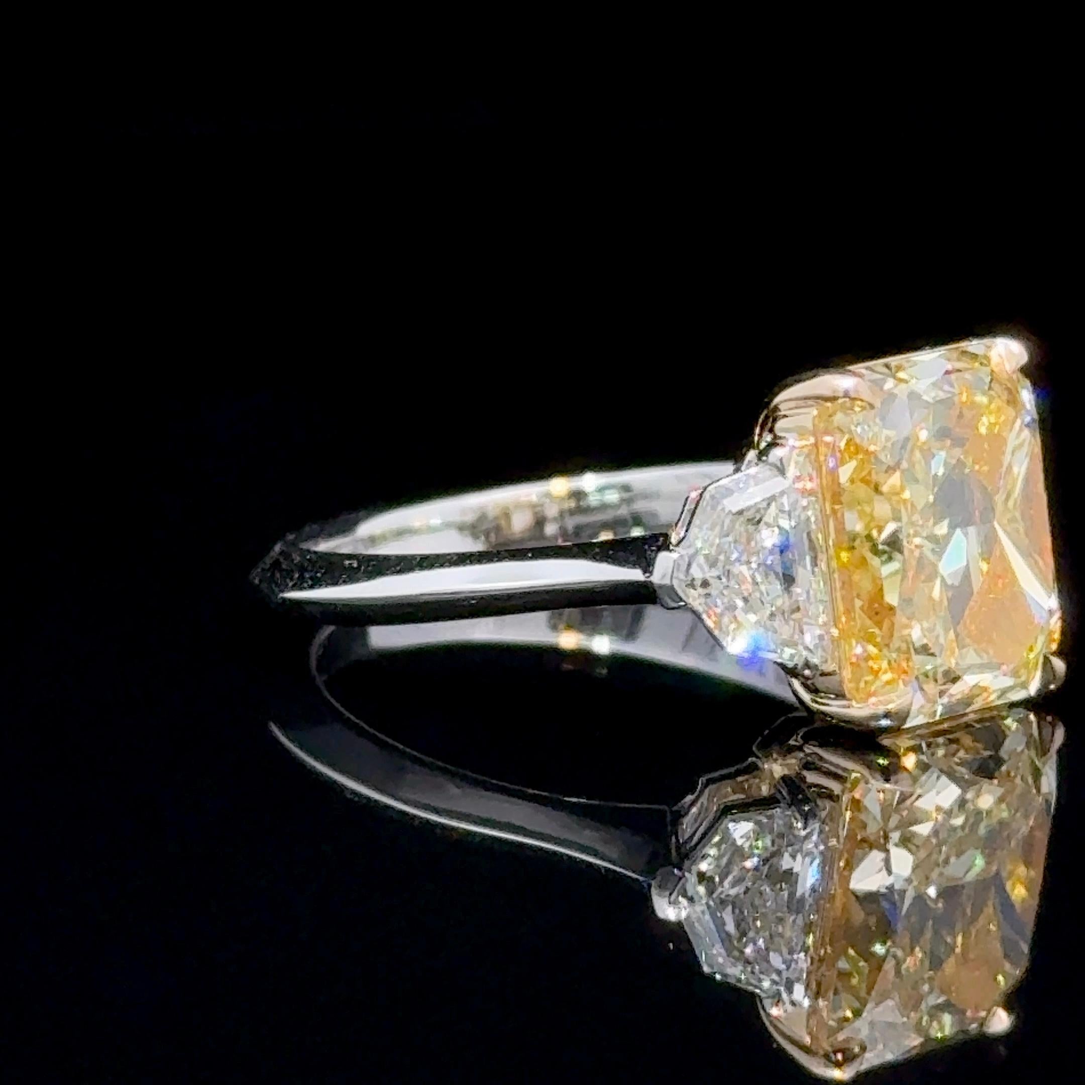 Amongst Yellow Natural Fancy Color Diamonds, Elongated, rectangular shapes are the most coveted and desired outlines for Radiant Cuts.

A GIA Certified 4.28 Carat Rectangular Radiant Fancy Yellow Internally Flawless Diamond Ring
GIA graded as Fancy