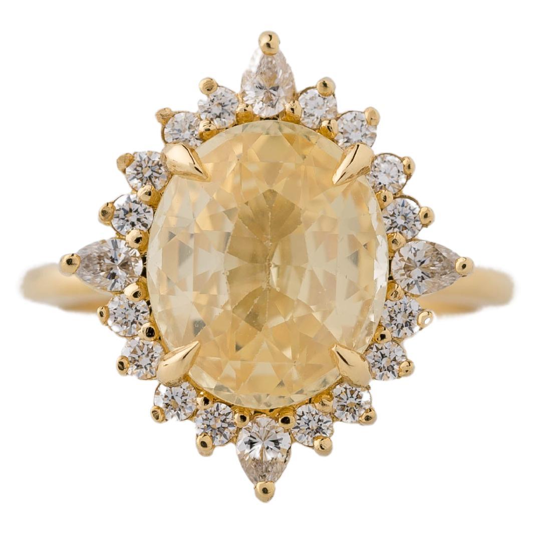 GIA Certified 4.29 Carat Oval Natural Yellow Sapphire Diamond Halo Ring  For Sale