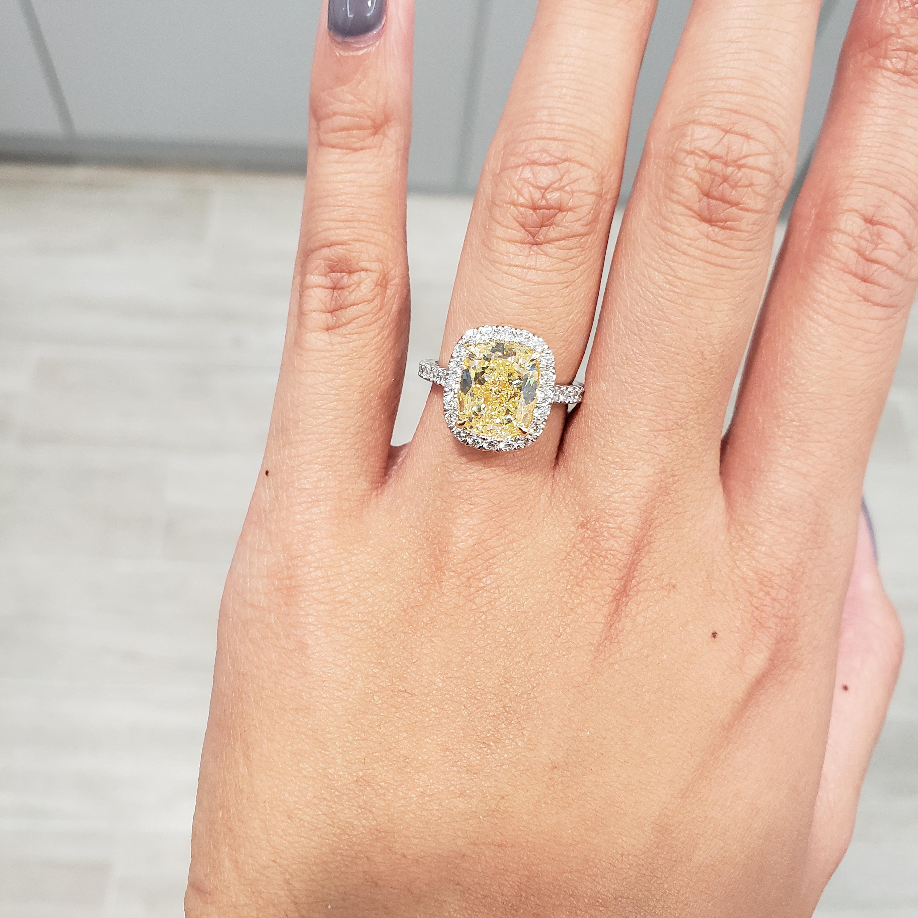 GIA Certified 4.30 Carat Cushion Cut Yellow Diamond Halo Engagement Ring In New Condition In New York, NY