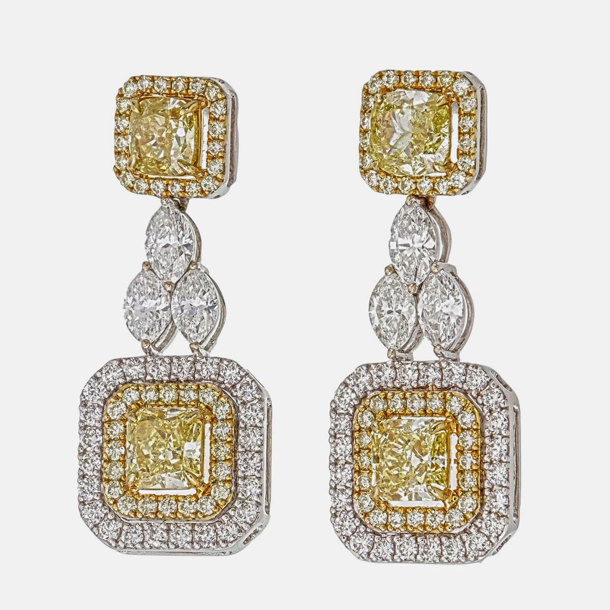 An elegant fancy intense yellow diamond earrings showcased by Rewa jewels is handcrafted in 18 karat white gold.

It has 80 pieces of round fancy yellow diamonds weighing 0.45 carat approximately and 48 pieces of round diamonds weighing