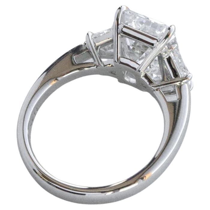 Contemporain GIA Certified 4 Carat Emerald Cut D Flawless Three-Stone Diamond Ring (bague à trois pierres) en vente