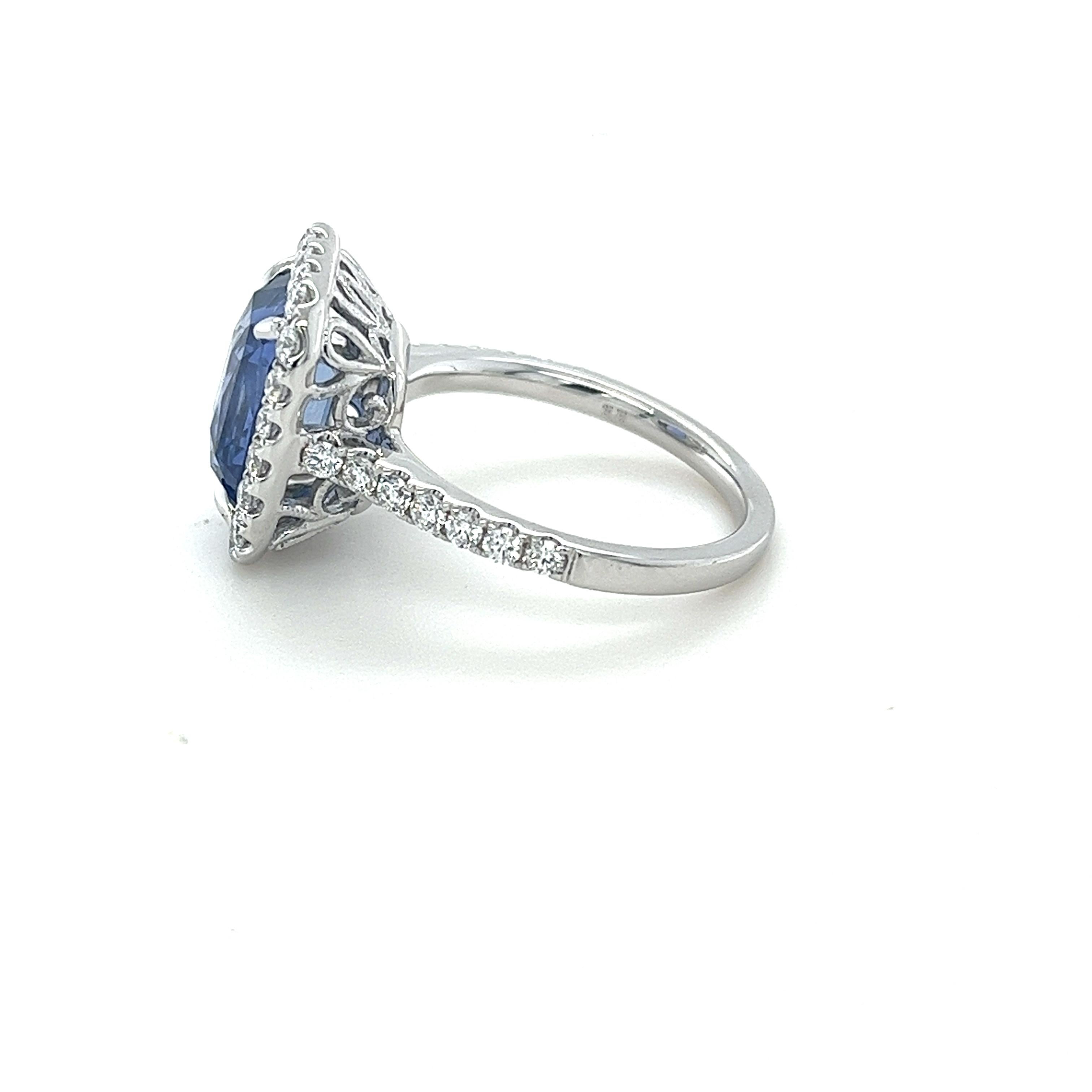 Modern GIA Certified 4.39 Carat Ceylon Sapphire & Diamond Halo Ring For Sale