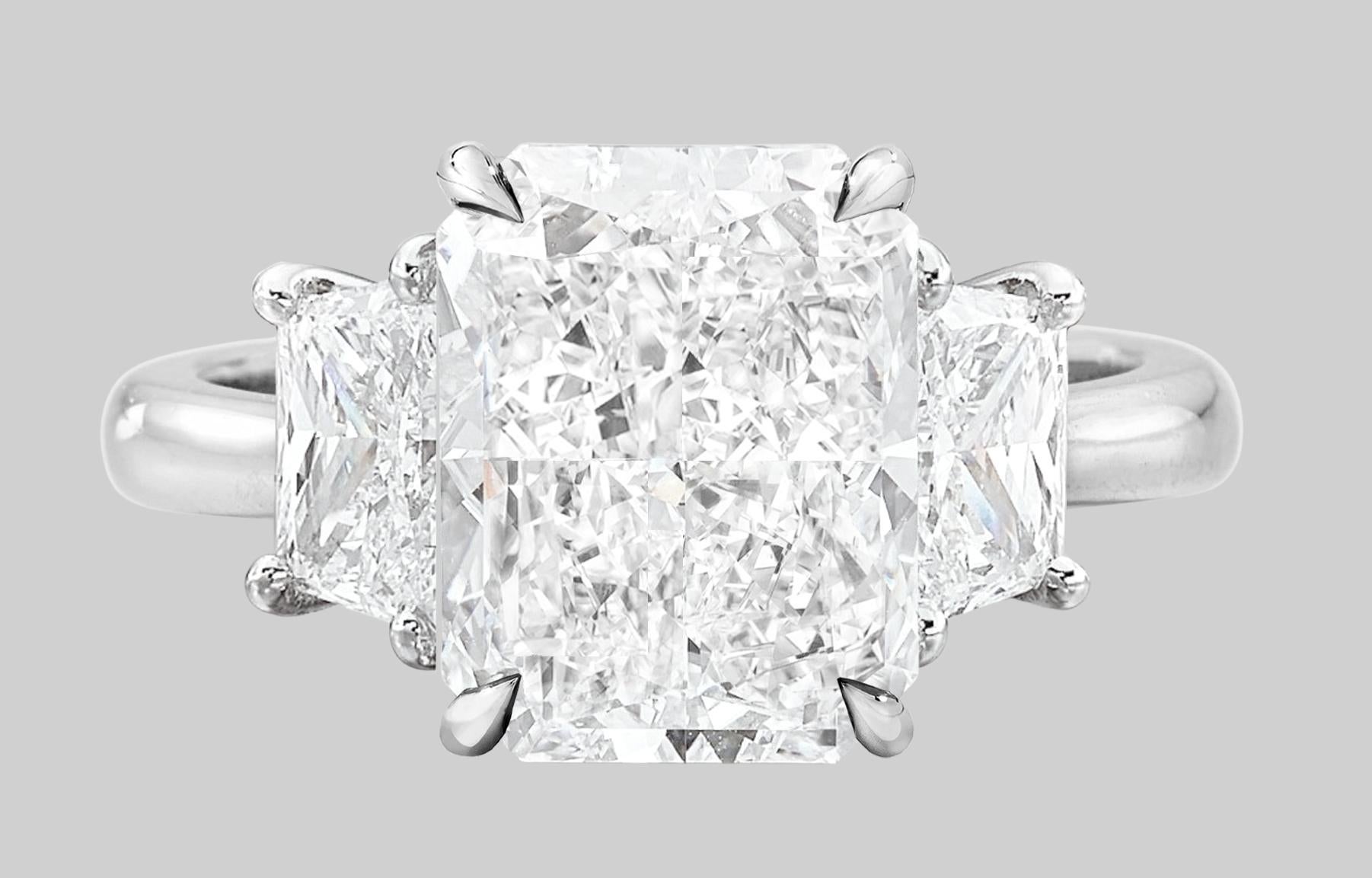 Contemporary GIA Certified 4.4 CT Radiant Cut Diamond Platinum Ring with Trapezoid Diamonds For Sale