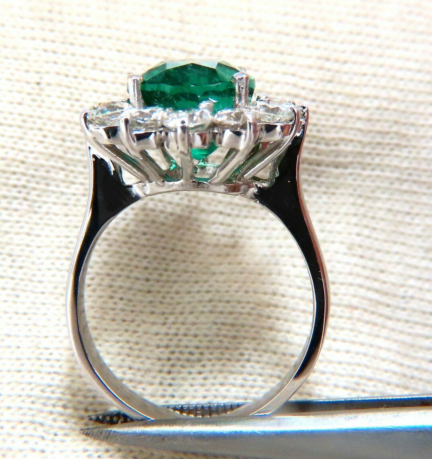 GIA Certified Natural Emerald diamonds ring.

4.40ct natural emerald

GIA Report # 2195998847

 Transparent, Green

Classic Oval brilliant cut

11.11 x 9.32 x 7.10mm

Minor 