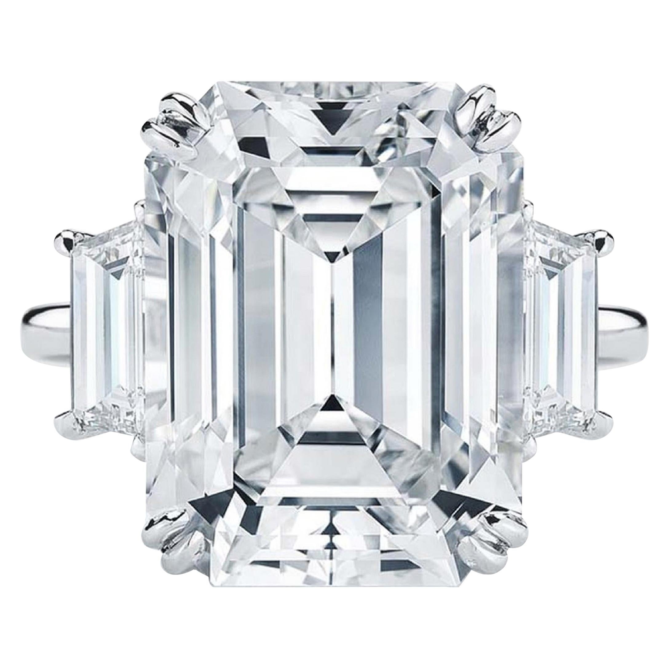 GIA Certified 4 Carat Emerald Cut Trapezoid Three Stone Platinum Ring