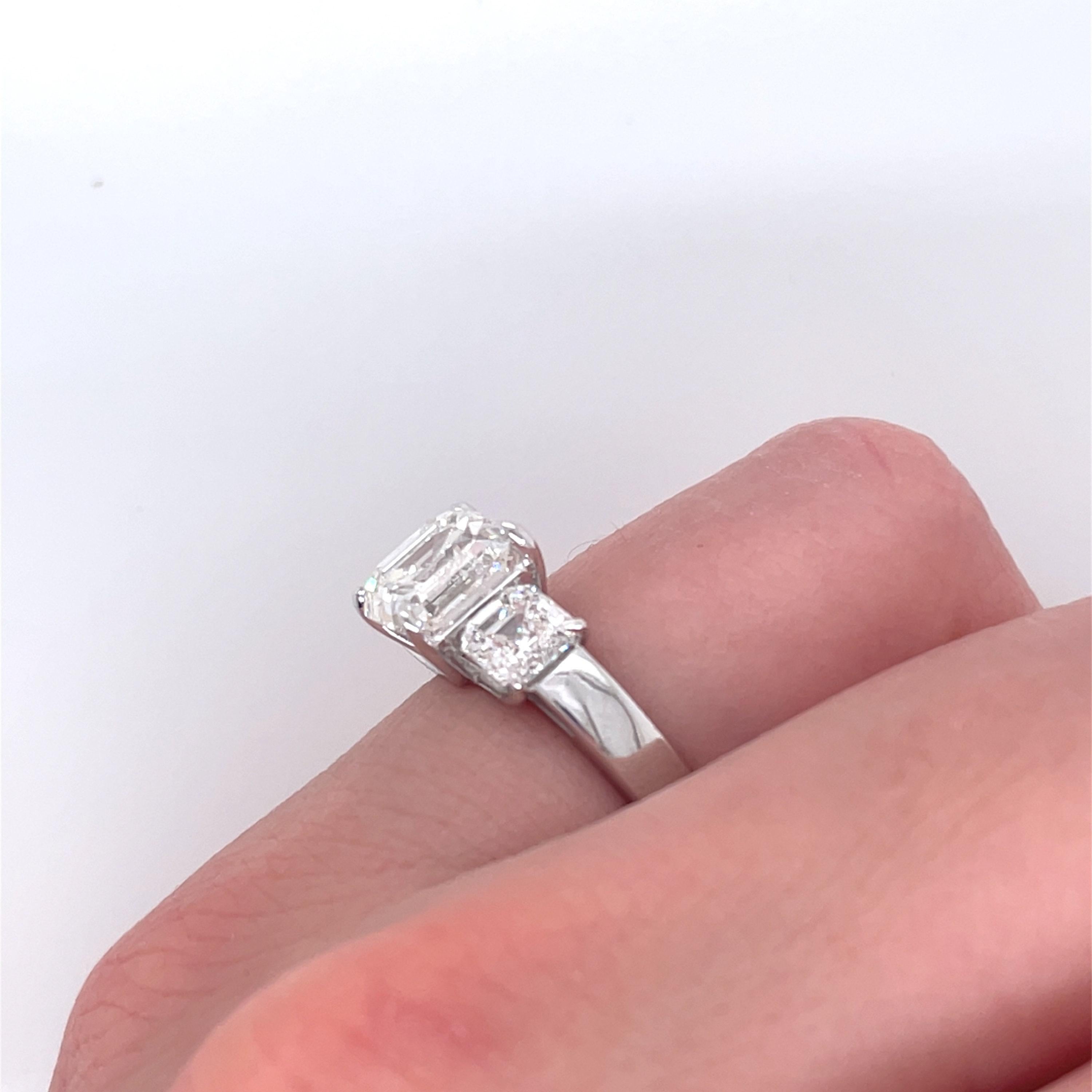 Emerald Cut GIA Certified 4.46 Carat Natural Diamond Three Stone Engagement Ring in Platinum For Sale