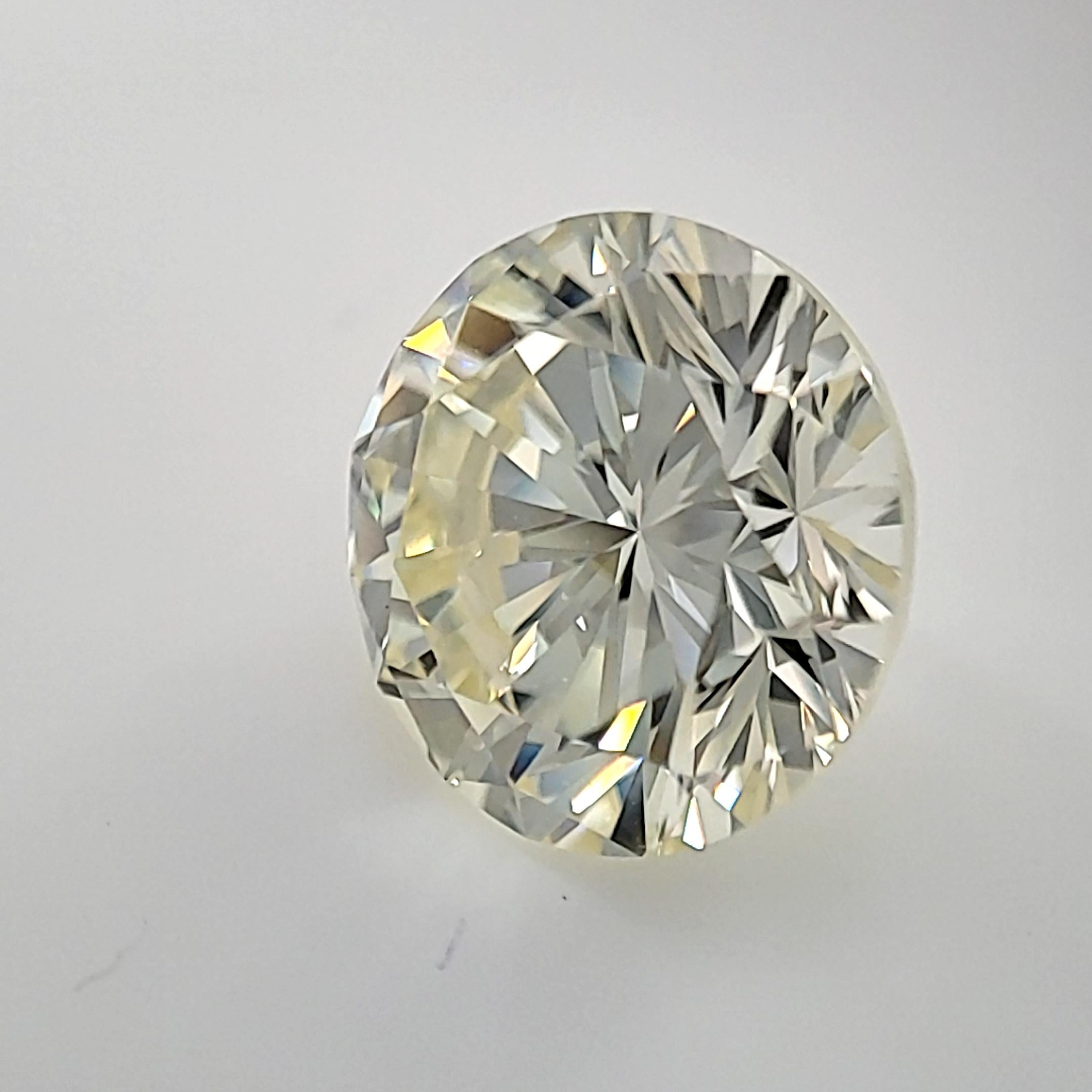 A O-P, VVS2 round brilliant natural diamond. We can custom make a setting for this diamond. Imagine a beautiful ring or pendant necklace. We will work with you to make something beautiful!

Measurements: 10.33 - 10.38 x 6.54 mm
Cut: Very Good 

