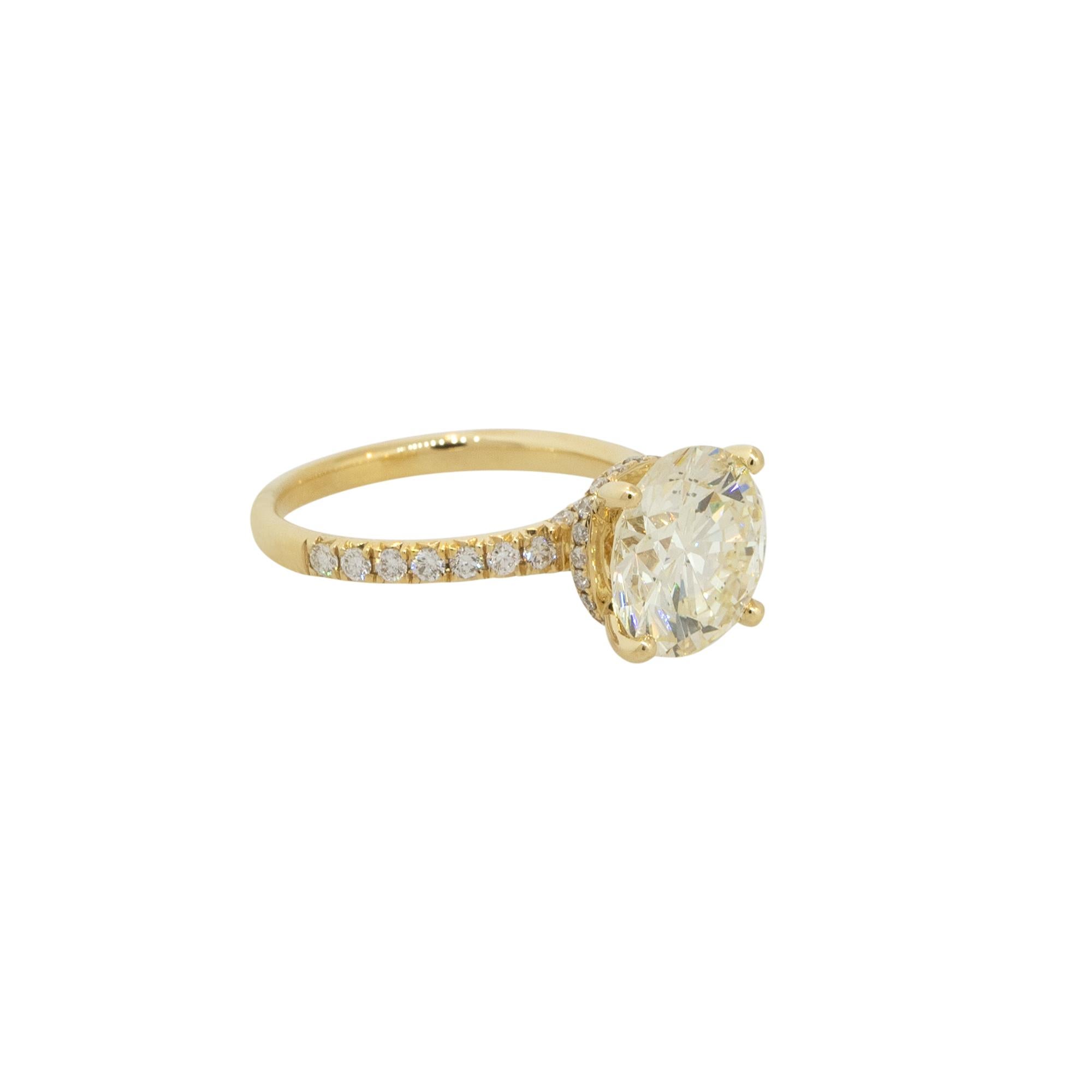 GIA Certified 18k Yellow Gold 4.47ctw Round Diamond Halo Engagement Ring

Material: 18k Yellow Gold
Center Diamond Details: Approx. 4.01ctw of Round Brilliant Cut Diamonds. Diamond is N in color and SI2 in clarity
GIA Cert #: 17444385
Mounting