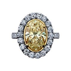 GIA Certified 4.47 Carats Oval Yellow Diamond Ring Plat/18KYG