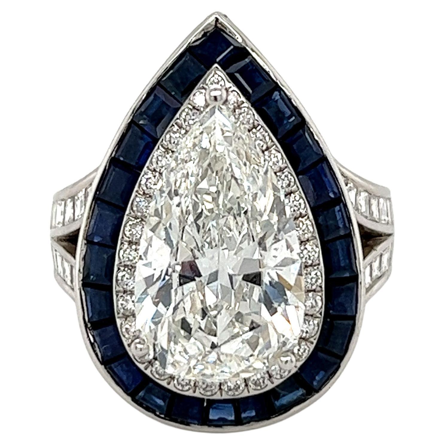 GIA Certified 4.48 Carat Pear Shape, H/SI2, Diamond and Blue Sapphire Ring