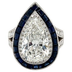 GIA Certified 4.48 Carat Pear Shape, H/SI2, Diamond and Blue Sapphire Ring