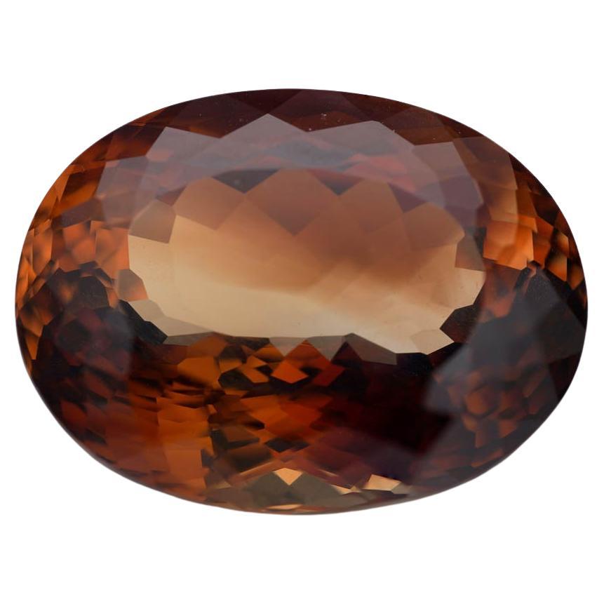 GIA Certified 44.88 Carat Oval Cut Brown Topaz in vendita