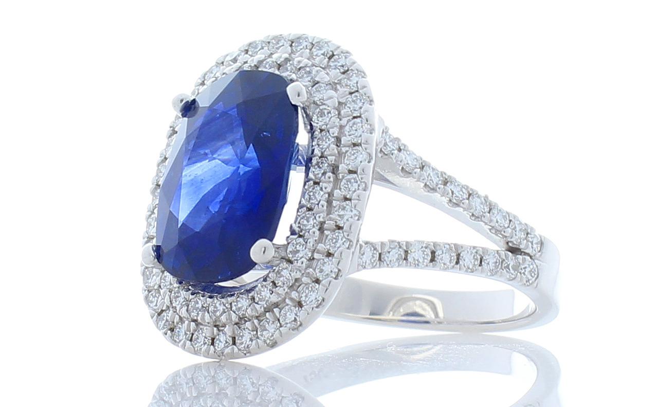Contemporary GIA Certified 4.49 Carat Cushion Cut Blue Sapphire and Diamond Cocktail Ring