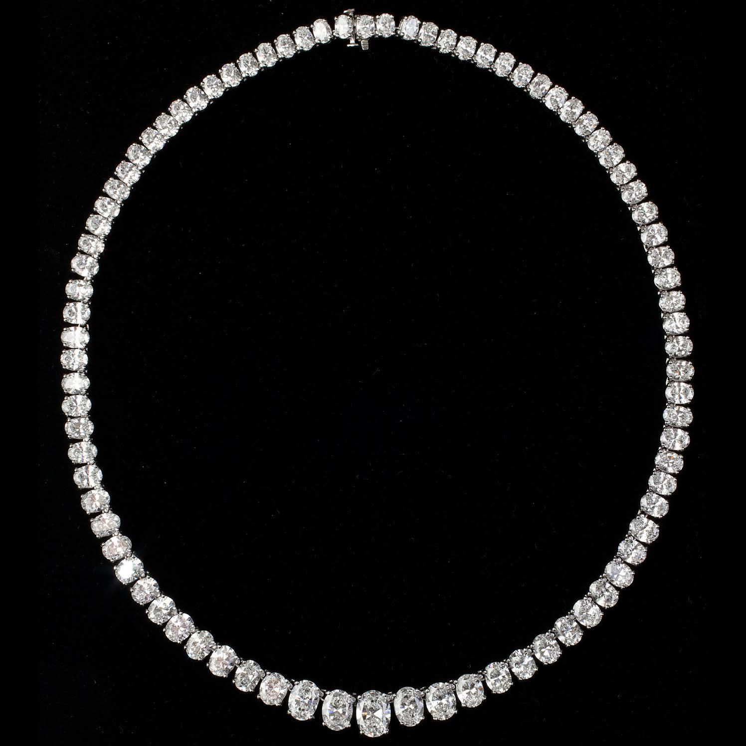 Incredible diamond graduated riviera diamond necklace
crafted in hand made platnium, showcasing extraordinary ideal oval shaped diamonds, 
weighing approximately 45 total carat weight, Diamonds range E-G color
Center stone is a sparkling 2 carat