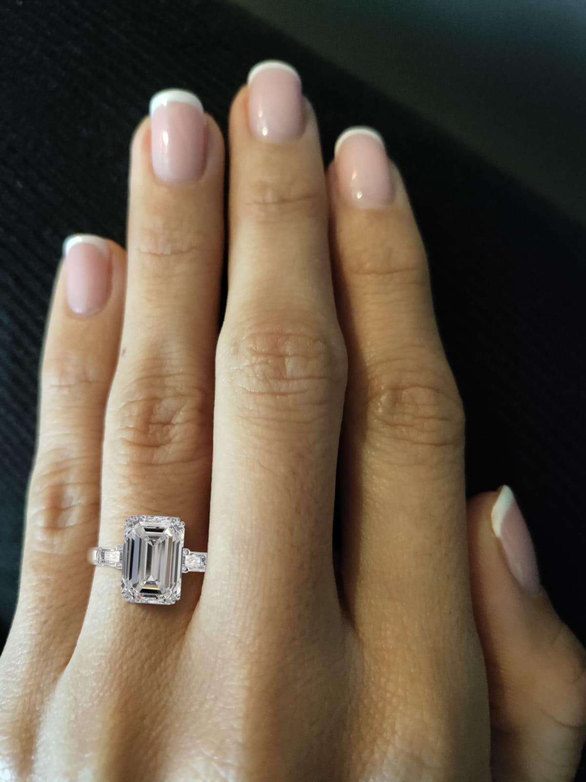 An exquisite GIA Certified 4 Carat Emerald Cut Diamond Ring VVS1 Clarity G Color mounted in solid 950 platinum.