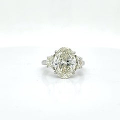 Louis Newman & Co 4.50 Carat Oval Diamond GIA Certified Three Stone Ring