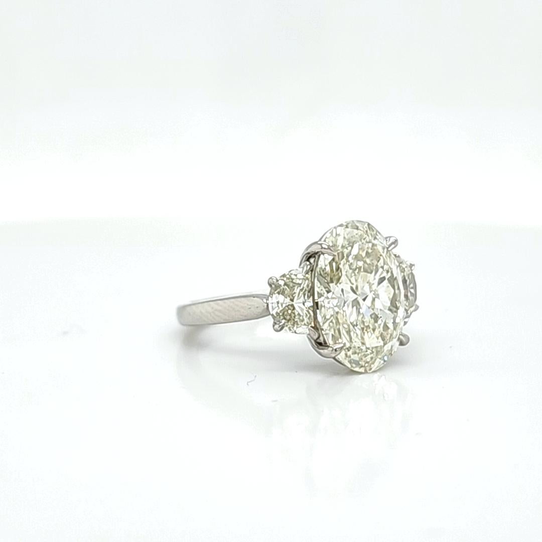 half carat oval diamond ring